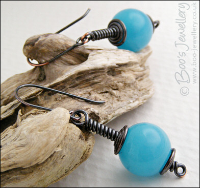 Darkly gunmetal copper earrings with turquoise dyed jade