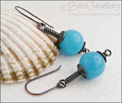 Darkly gunmetal copper earrings with turquoise dyed jade