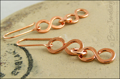 Figure of 8 link earrings in polished copper