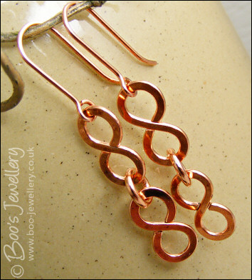 Figure of 8 link earrings in polished copper