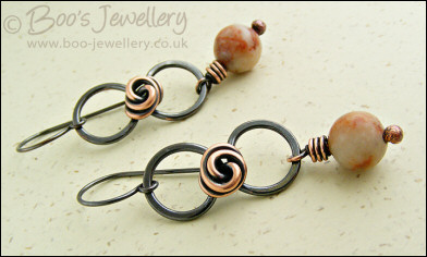Oxidised figure of 8 copper earrings with rosebud knot