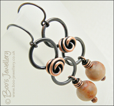 Oxidised figure of 8 copper earrings with rosebud knot