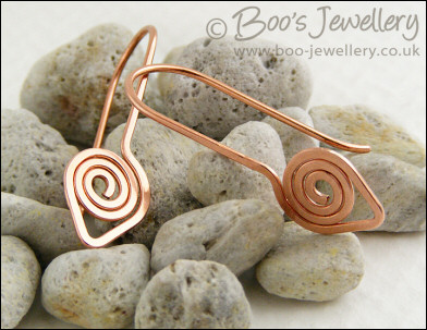 Polished and hammered copper spiral leaf earrings