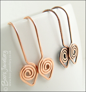 Polished and hammered copper spiral leaf earrings