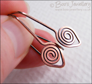 Polished and hammered copper spiral leaf earrings