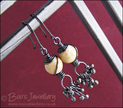 Oxidised earrings with river stones and copper raindrops