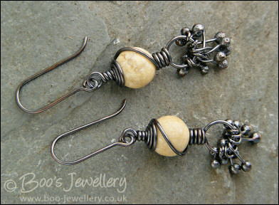 Oxidised earrings with river stones and copper raindrops