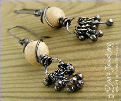 Oxidised earrings with river stones and copper raindrops