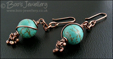 Turquoise and antiqued copper earrings with molten buds