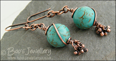 Turquoise and antiqued copper earrings with molten buds