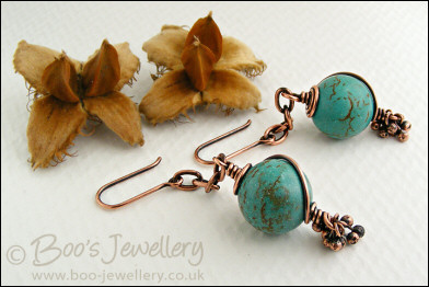 Turquoise and antiqued copper earrings with molten buds