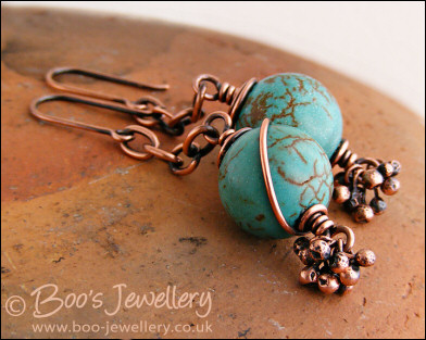 Turquoise and antiqued copper earrings with molten buds
