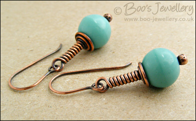Vintage glass earrings on long drop wrapped antiqued copper