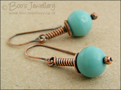 Vintage glass earrings on long drop wrapped antiqued copper
