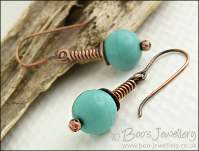 Vintage glass earrings on long drop wrapped antiqued copper