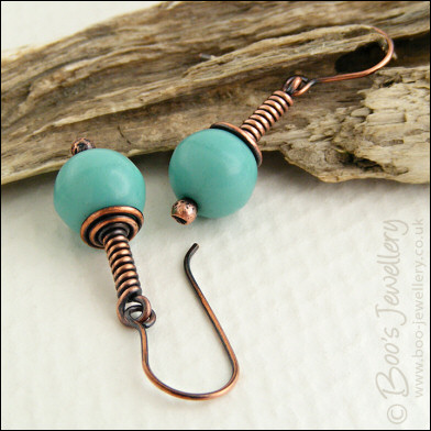 Vintage glass earrings on long drop wrapped antiqued copper