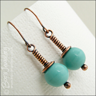 Vintage glass earrings on long drop wrapped antiqued copper