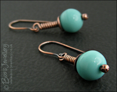 Vintage glass earrings on long drop wrapped antiqued copper