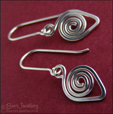 Spiralled leaf shape Sterling silver earrings