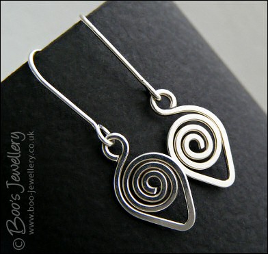 Spiralled leaf shape Sterling silver earrings
