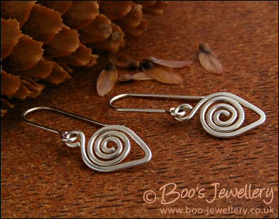 Spiralled leaf shape Sterling silver earrings