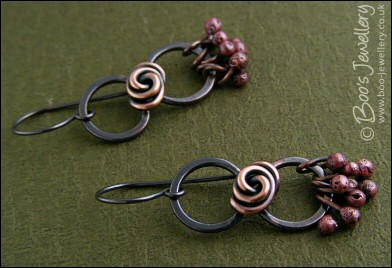RESERVED - Antiqued copper figure of 8 rosebud knot earrings with rosy raindrops