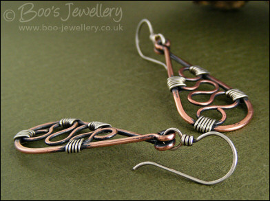 Squiggle filled teardrop earrings in copper and silver