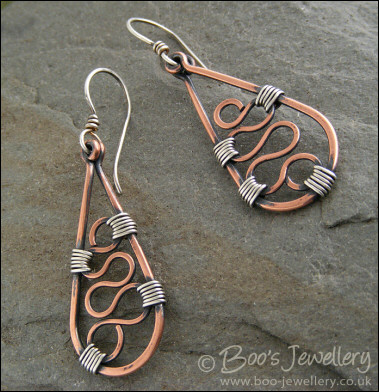Squiggle filled teardrop earrings in copper and silver