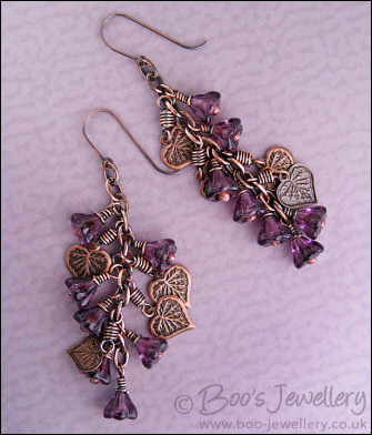 Long flower and leaf cluster earrings