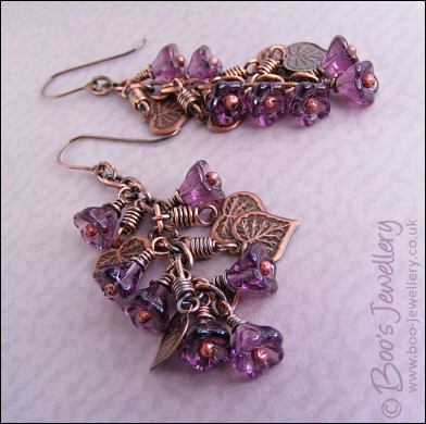 Long flower and leaf cluster earrings