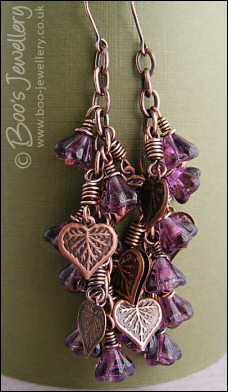 Long flower and leaf cluster earrings