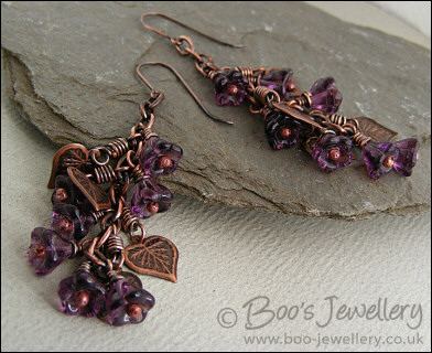 Long flower and leaf cluster earrings