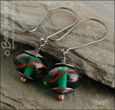 Oxidised gunmetal copper and green glass earrings