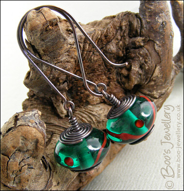 Oxidised gunmetal copper and green glass earrings