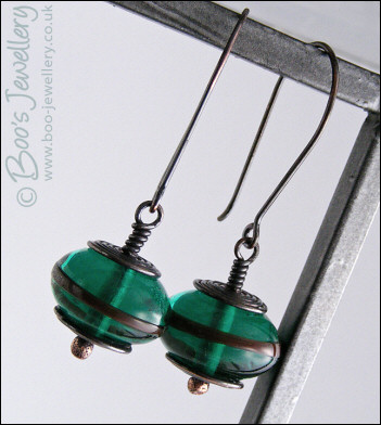 Oxidised copper with green glass long drop earrings
