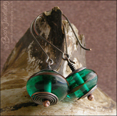 Oxidised copper with green glass long drop earrings