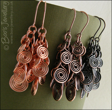 Fluid copper spirals earrings