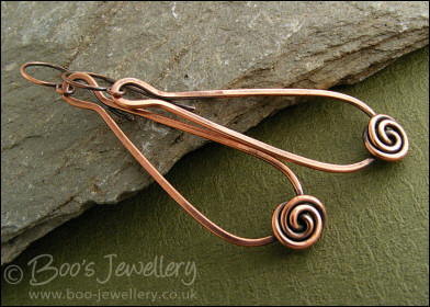 Long teardrop loop and rosebud knot earrings