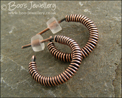 Wire wrapped copper hoop earrings with a post fitting