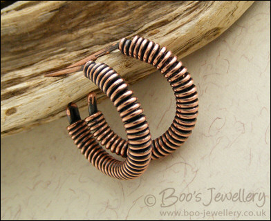 Wire wrapped copper hoop earrings with a post fitting