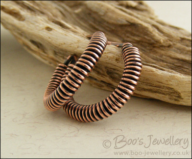 Wire wrapped copper hoop earrings with a post fitting