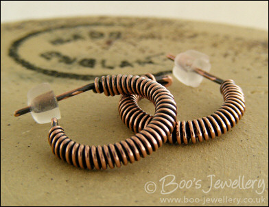 Wire wrapped copper hoop earrings with a post fitting