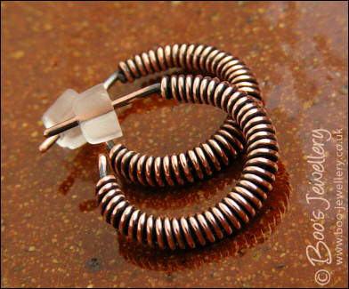 Wire wrapped copper hoop earrings with a post fitting