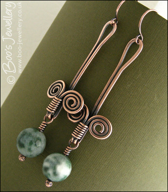 Egyptian coil and faceted green jade earrings