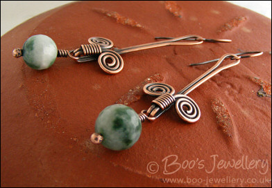 Egyptian coil and faceted green jade earrings