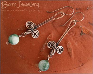 Egyptian coil and faceted green jade earrings