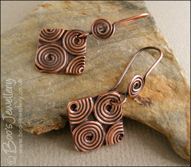 Antiqued copper spiral theme square earrings