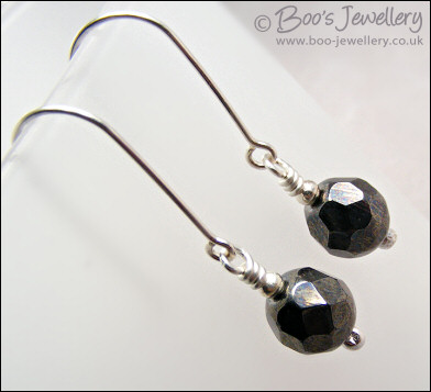 Gunmetal faceted crystal earrings on long silver drops