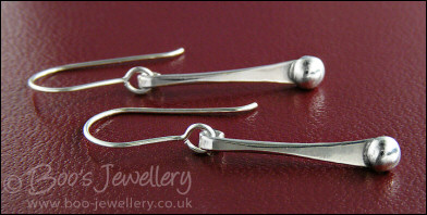 Sterling silver drop earrings with pebbles of solid silver