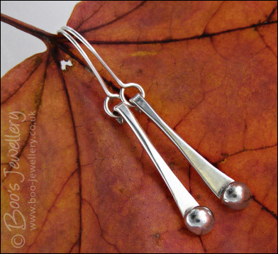 Sterling silver drop earrings with pebbles of solid silver